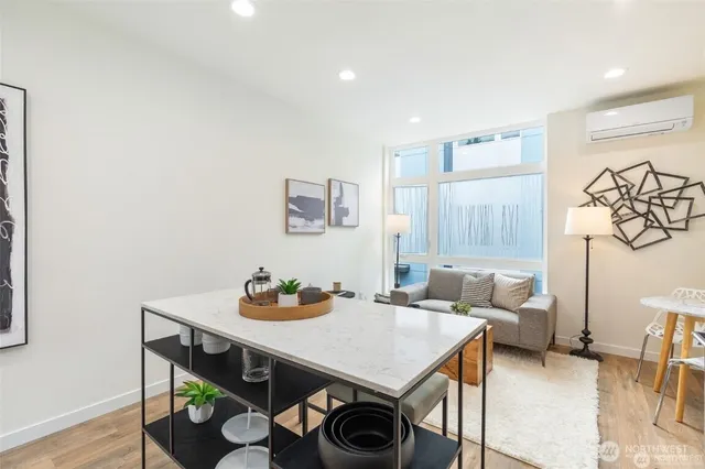 a living room with furniture and a table