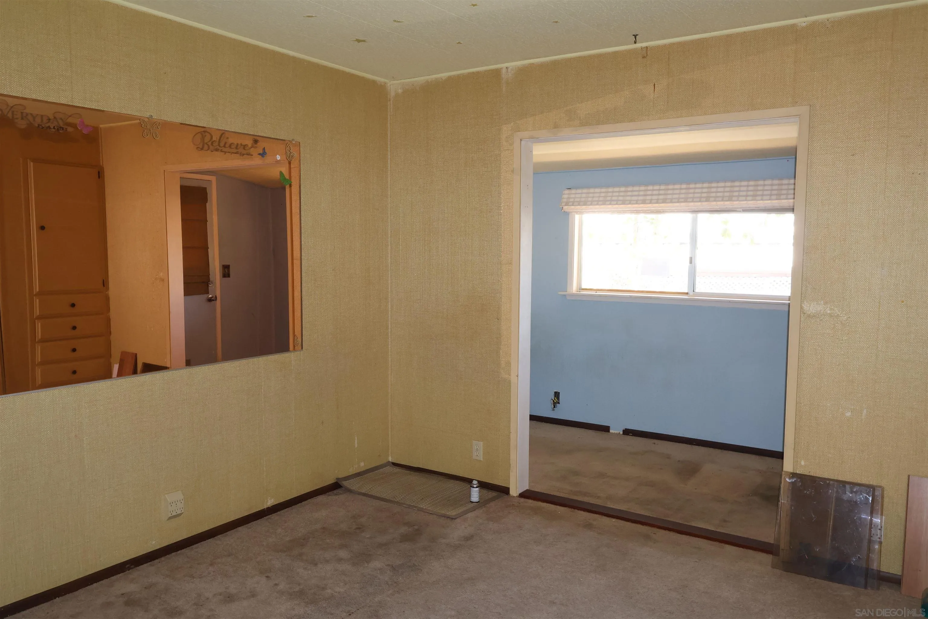 4747 Oak Crest Road, Unit 48 Fallbrook, CA 92028 - Photo 16 of 22 a view of an empty room with a window