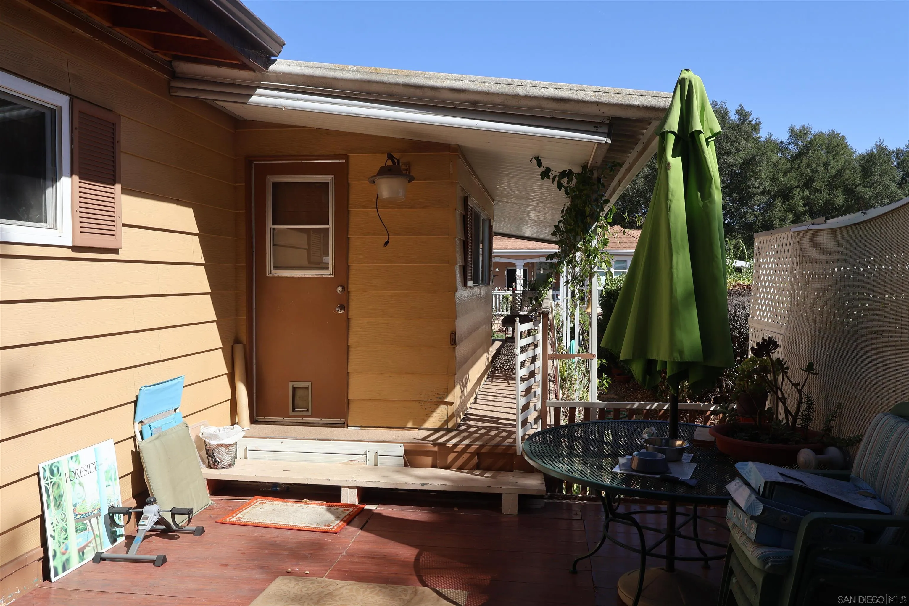 4747 Oak Crest Road, Unit 48 Fallbrook, CA 92028 - Photo 22 of 22 a view of a house with a park