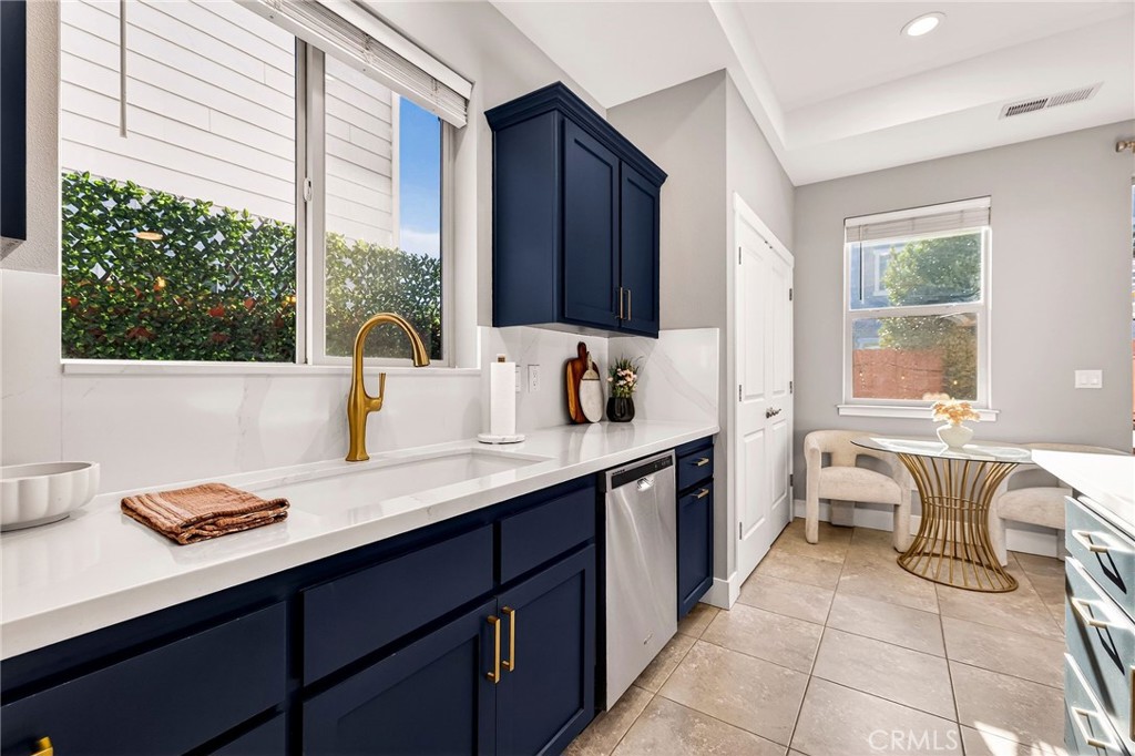 2855 Pin Oak Lane Chico, CA 95928 - Photo 14 of 48 a kitchen with a sink and a window