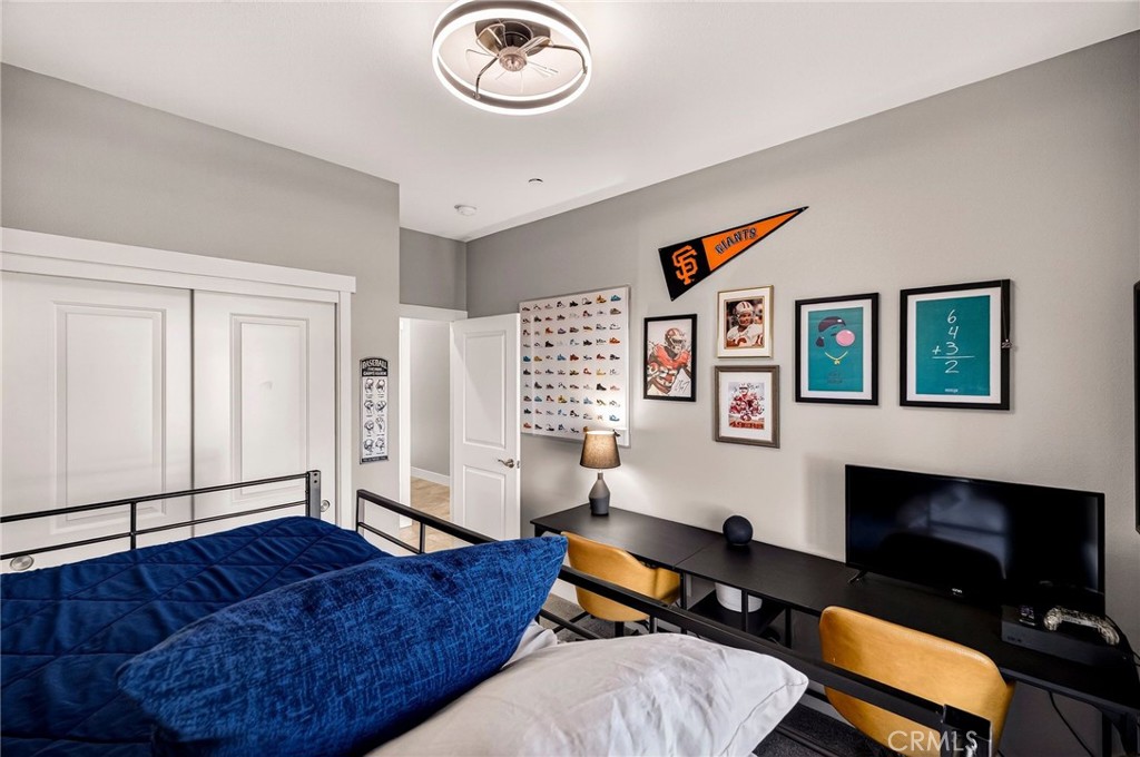 2855 Pin Oak Lane Chico, CA 95928 - Photo 25 of 48 a living room with furniture a flat screen tv and a fireplace