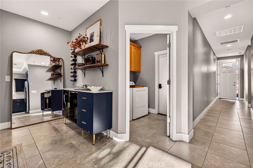 2855 Pin Oak Lane Chico, CA 95928 - Photo 32 of 48 a view of a hallway and a livingroom with furniture