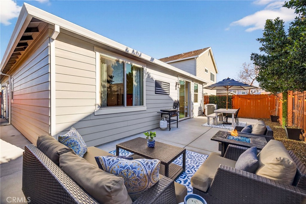 2855 Pin Oak Lane Chico, CA 95928 - Photo 37 of 48 a outdoor space with patio the couches and a fireplace