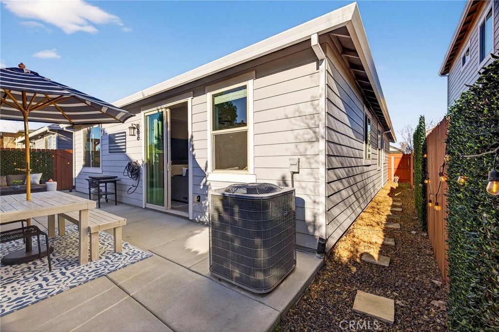 2855 Pin Oak Lane Chico, CA 95928 - Photo 38 of 48 a view of a patio with couches table and chairs and potted plants