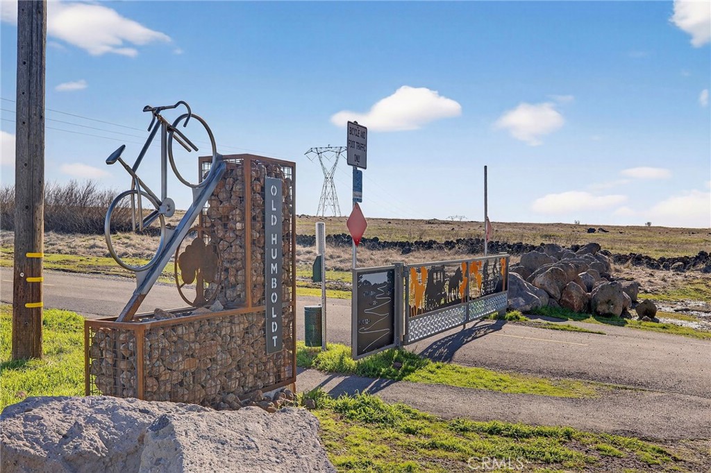 2855 Pin Oak Lane Chico, CA 95928 - Photo 47 of 48 a view of a terrace with a floor to ceiling window and potted plants