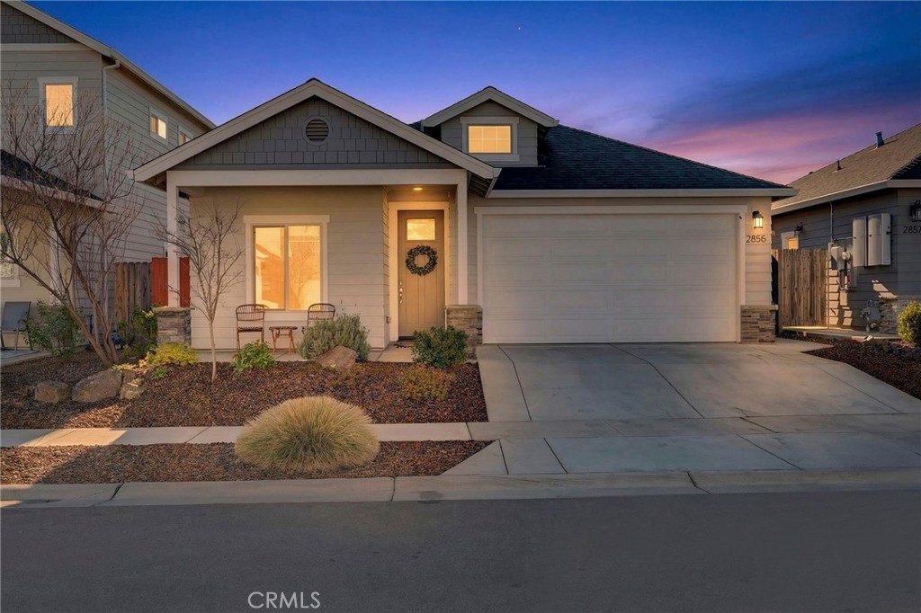 2855 Pin Oak Lane Chico, CA 95928 - Photo 48 of 48 a front view of a house with garden