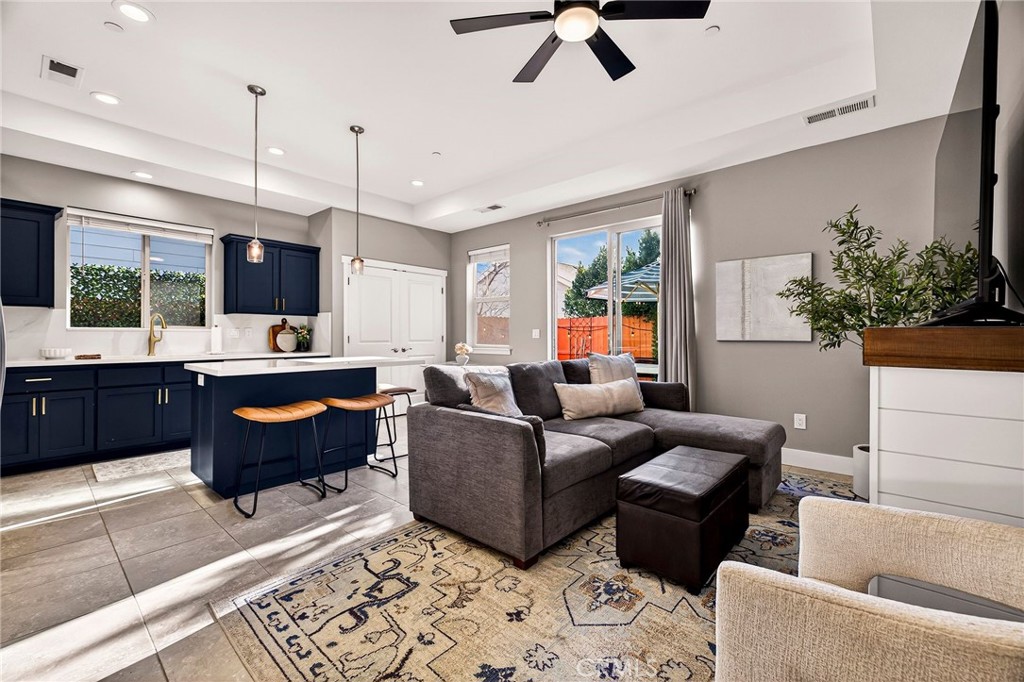 2855 Pin Oak Lane Chico, CA 95928 - Photo 5 of 48 a living room with furniture and a flat screen tv