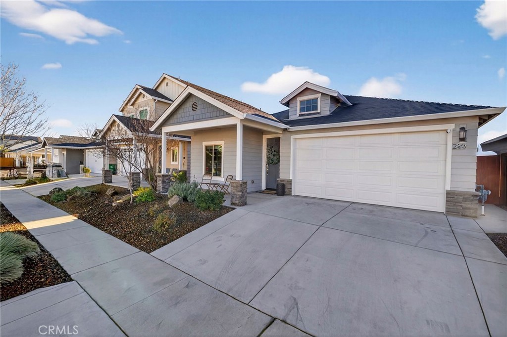2855 Pin Oak Lane Chico, CA 95928 - Photo 9 of 48 a front view of a house with yard