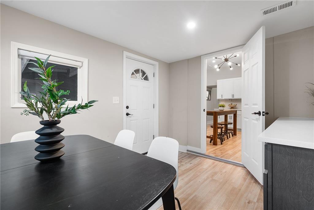 106 44th Street Pittsburgh, PA 15201 - Photo 14 of 41 a view of a livingroom with furniture and a potted plant