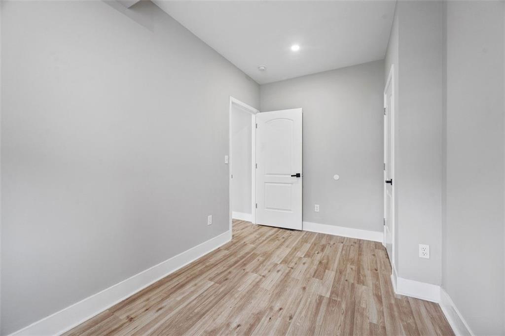106 44th Street Pittsburgh, PA 15201 - Photo 30 of 41 a view of room with closet and wooden floor