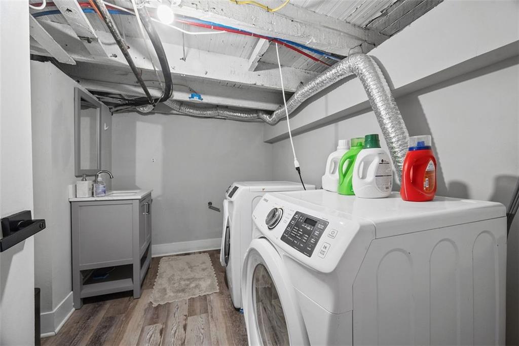106 44th Street Pittsburgh, PA 15201 - Photo 32 of 41 a utility room with dryer and washer