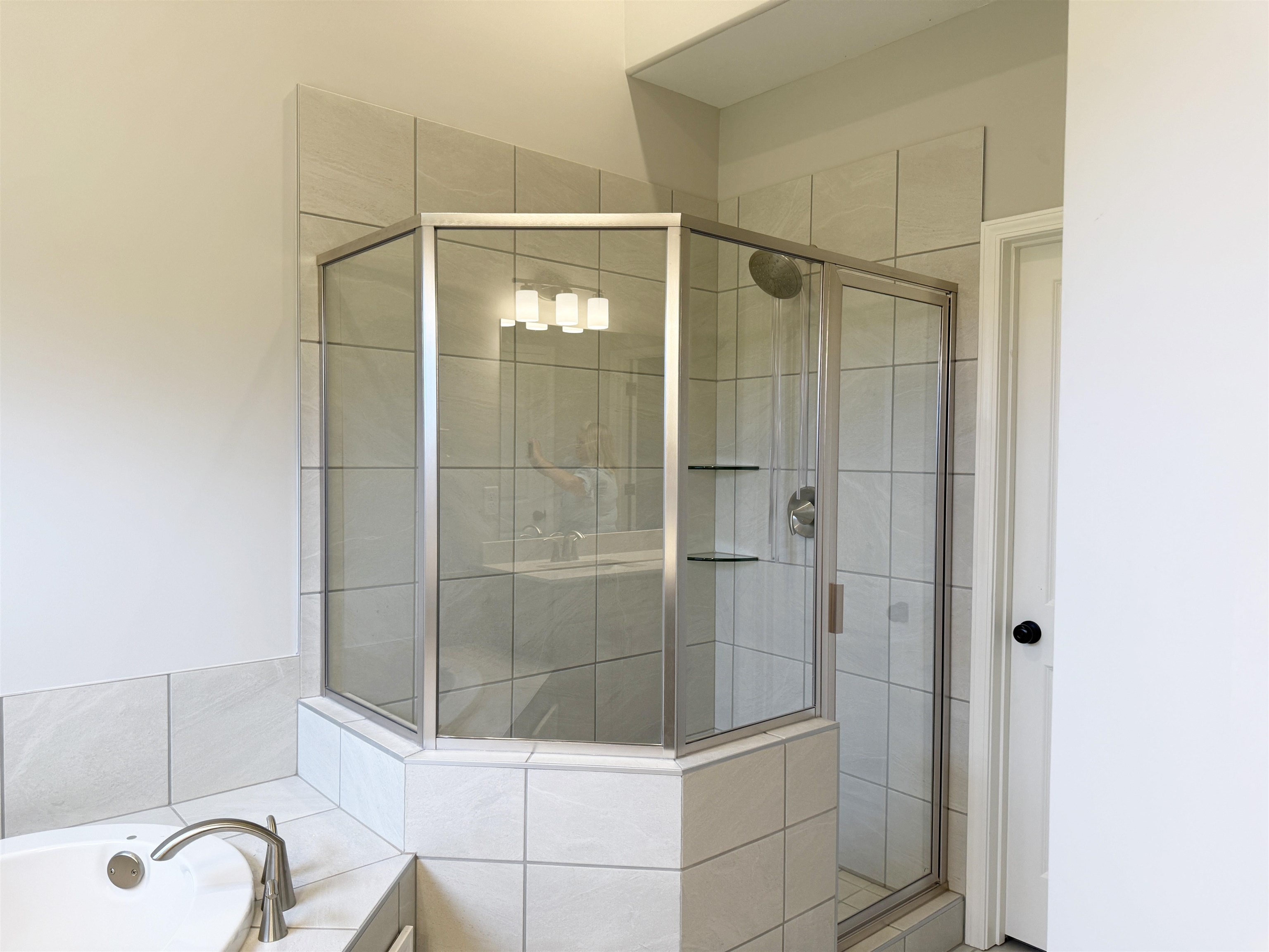 195 Ridgefield Drive Oakland, TN 38060 - Photo 17 of 29 a bathroom with a shower and a sink