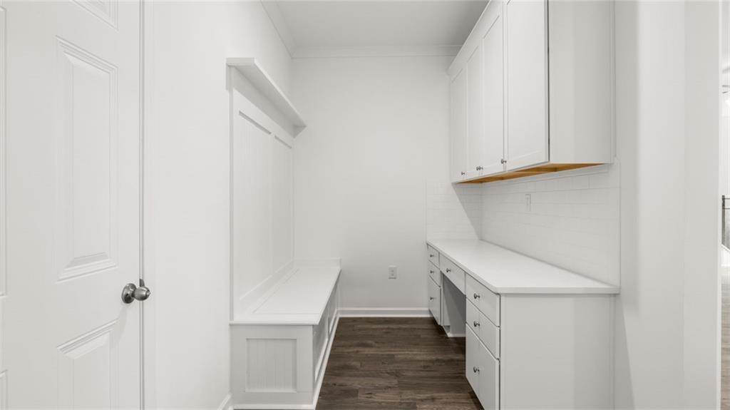 1775 Goodwin Drive Hampton, GA 30228 - Photo 19 of 49 a view of a hallway with washer and dryer