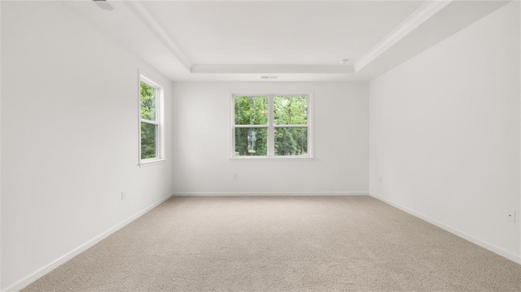 1775 Goodwin Drive Hampton, GA 30228 - Photo 24 of 49 an empty room with windows
