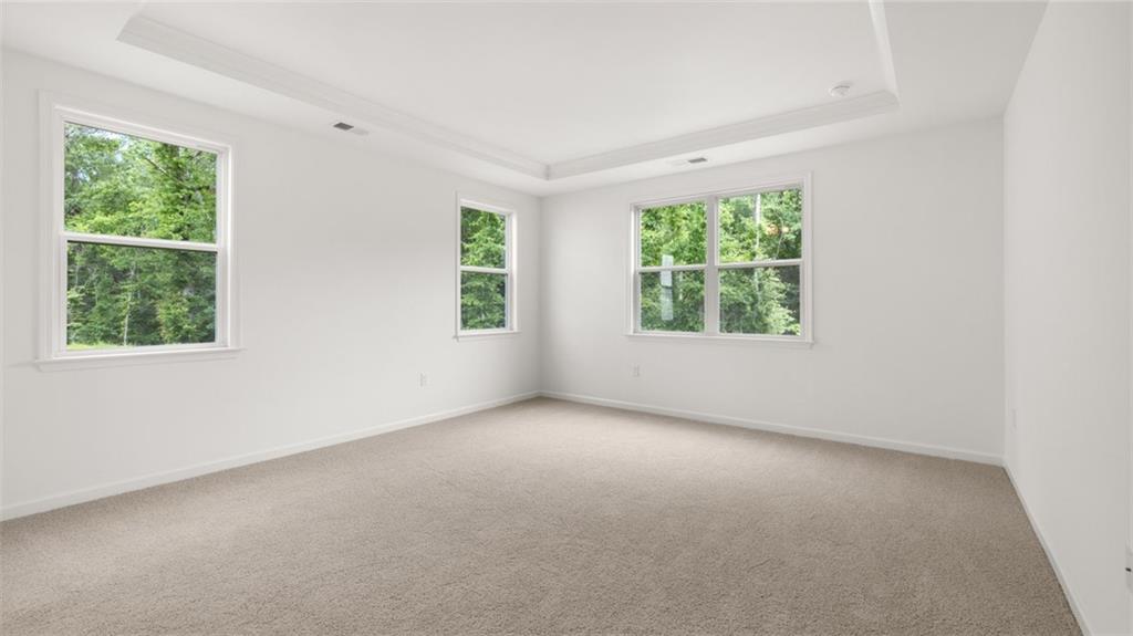 1775 Goodwin Drive Hampton, GA 30228 - Photo 25 of 49 an empty room with windows