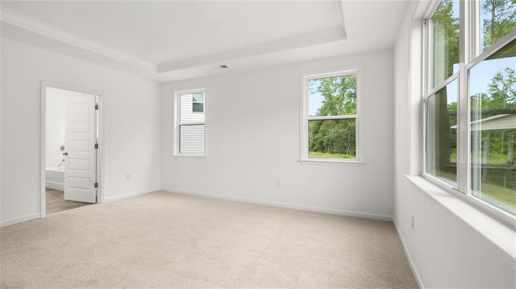 1775 Goodwin Drive Hampton, GA 30228 - Photo 26 of 49 an empty room with windows