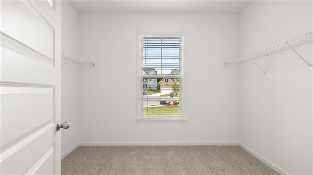 1775 Goodwin Drive Hampton, GA 30228 - Photo 30 of 49 an empty room with windows