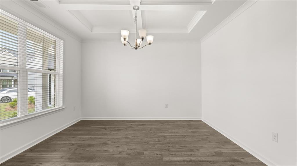 1775 Goodwin Drive Hampton, GA 30228 - Photo 8 of 49 a view of empty room with wooden floor and fan