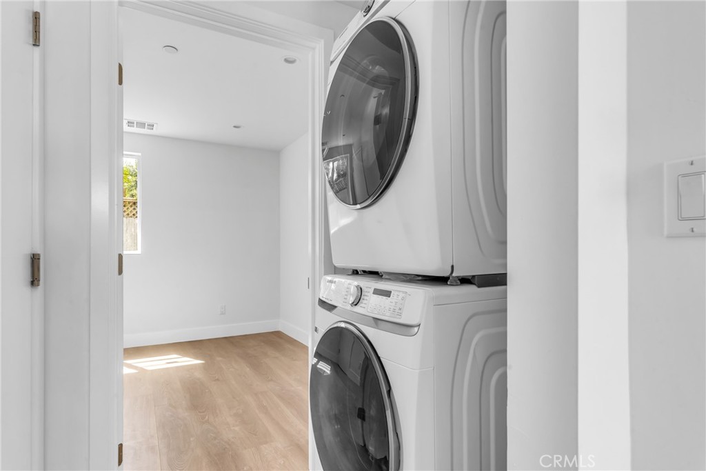 4453 Colfax Avenue, Unit 2 Studio City, CA 91602 - Photo 14 of 60 a utility room with dryer and washer