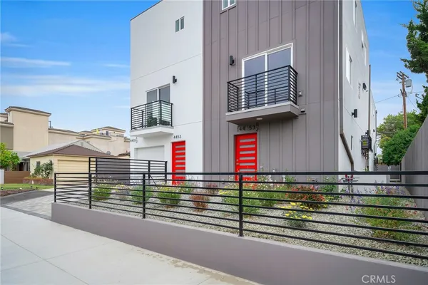 a view of a yard from a balcony