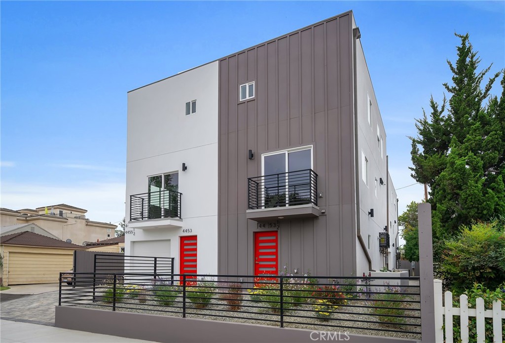 4453 Colfax Avenue, Unit 2 Studio City, CA 91602 - Photo 30 of 60 a front view of a house with garage