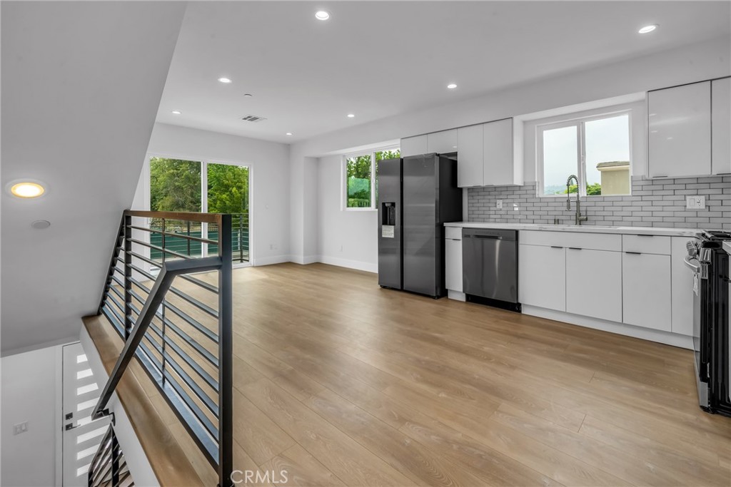 4453 Colfax Avenue, Unit 2 Studio City, CA 91602 - Photo 39 of 60 a view of a kitchen with stainless steel appliances granite countertop a stove and a refrigerator