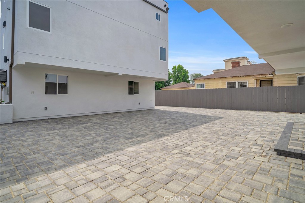 4453 Colfax Avenue, Unit 2 Studio City, CA 91602 - Photo 55 of 60 a view of house with wooden fence