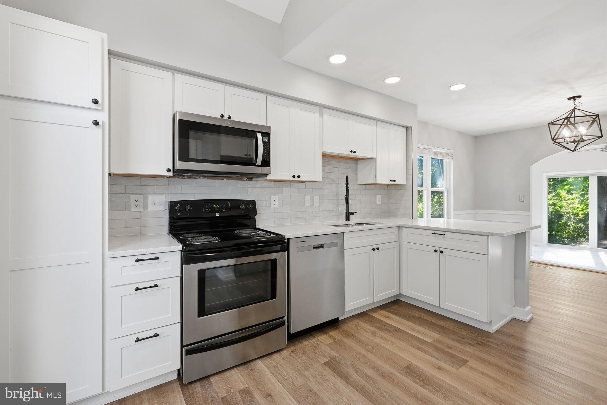 1529 Ritchie Lane Annapolis, MD 21401 - Photo 9 of 35 Modern kitchen with sleek finishes.