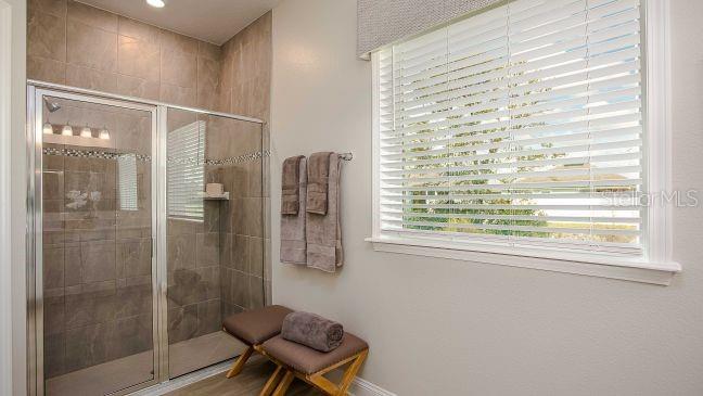 10 Fitzgerald Lane Palm Coast, FL 32137 - Photo 9 of 19 a bathroom with a shower and a toilet