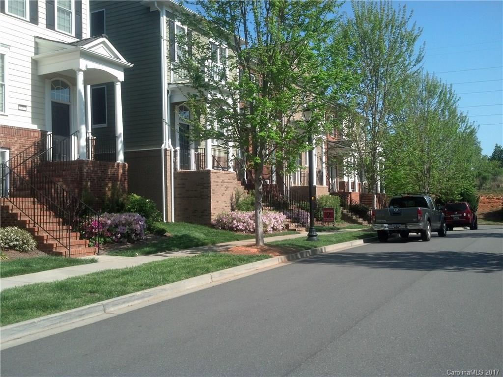 809 Granby Drive, Unit 38 Fort Mill, SC 29708 - Photo 1 of 15 a view of a parked cars in front of a house
