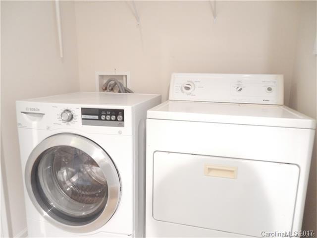 809 Granby Drive, Unit 38 Fort Mill, SC 29708 - Photo 14 of 15 a utility room with dryer and washer