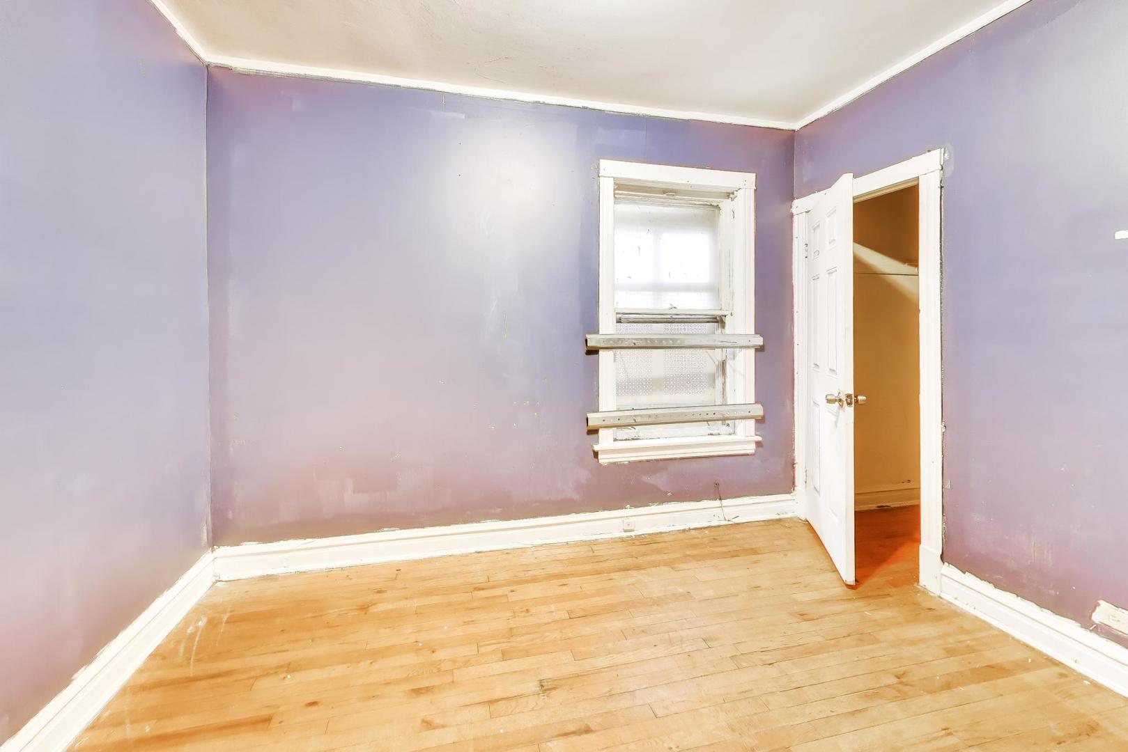 5738 South Ada Street Chicago, IL 60636 - Photo 11 of 22 a view of empty room with window