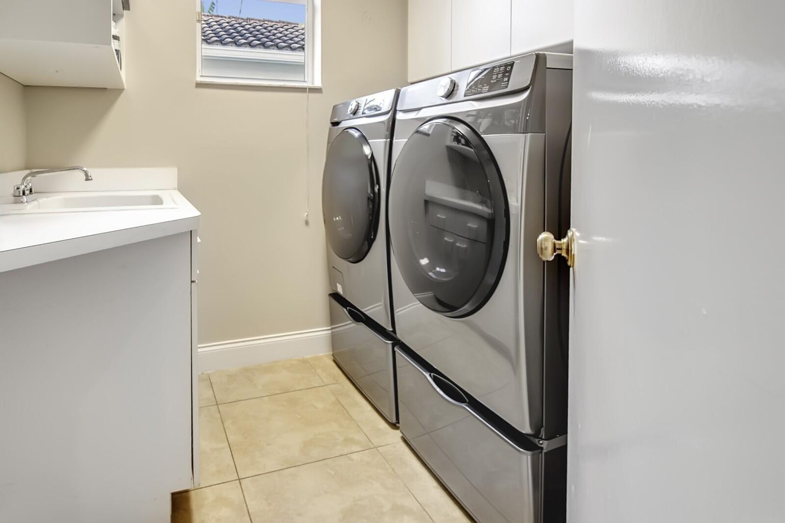 6684 Northwest 23rd Terrace Boca Raton, FL 33496 - Photo 13 of 24 Laundry Room