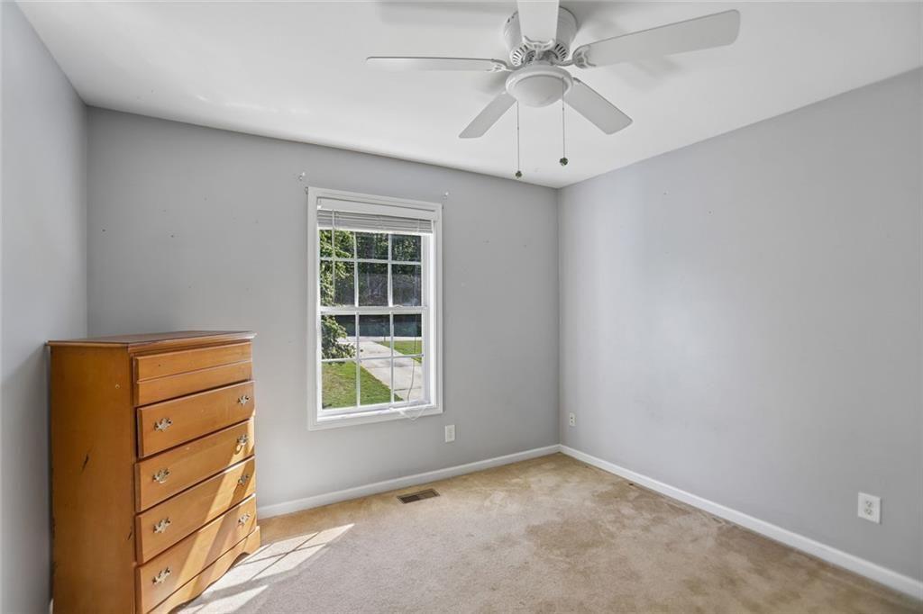 9720 Poole Road Villa Rica, GA 30180 - Photo 21 of 40 an empty room with a window