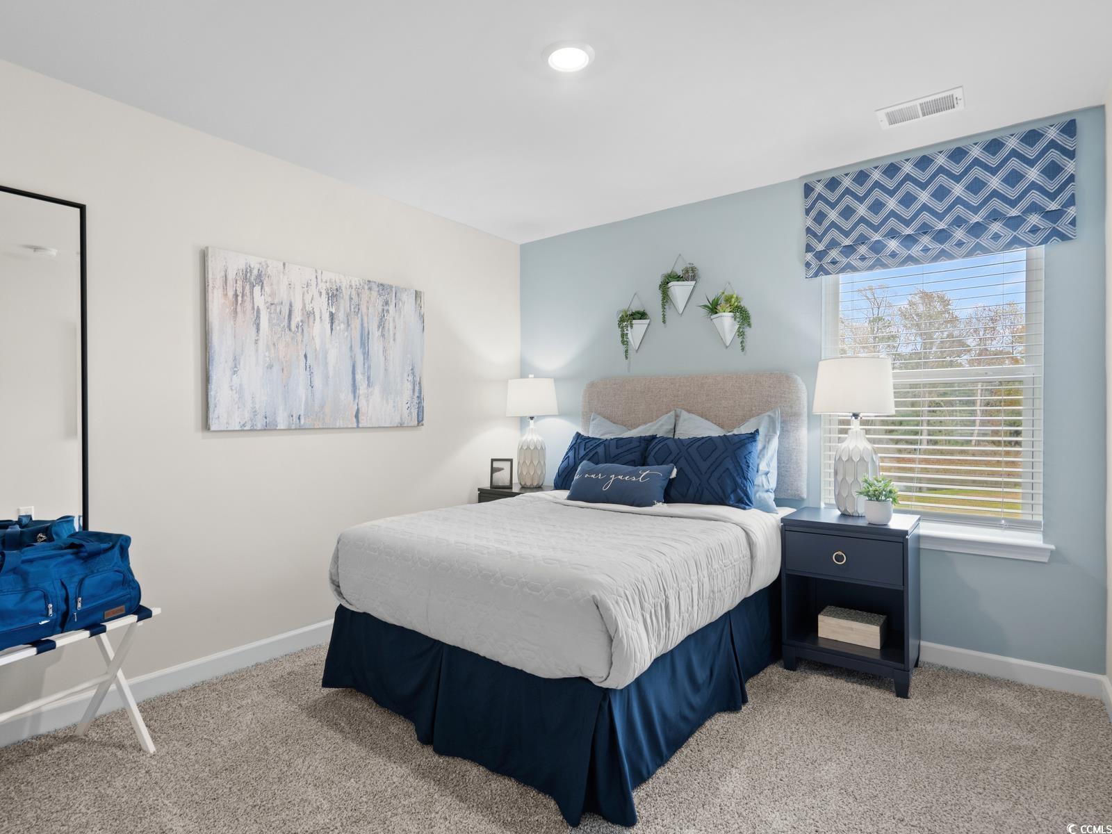 8223 Energize Drive Longs, SC 29568 - Photo 2 of 17 Photo is not of the actual home, but is an inspirational photo of builder’s model home.