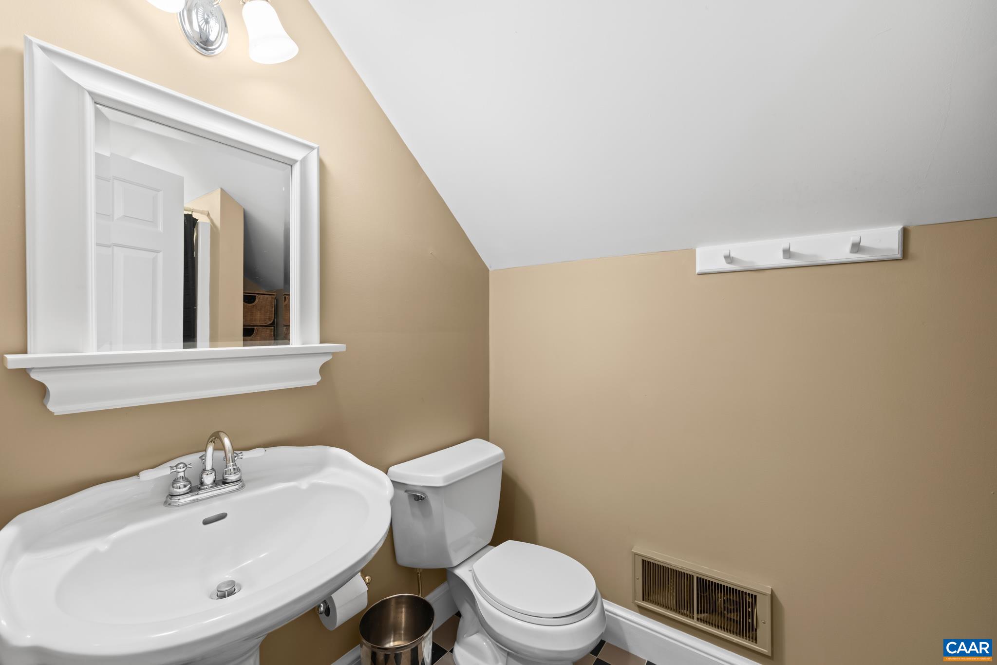 480 Dawsonville Road Barboursville, VA 22923 - Photo 41 of 55 a bathroom with a toilet a sink and mirror