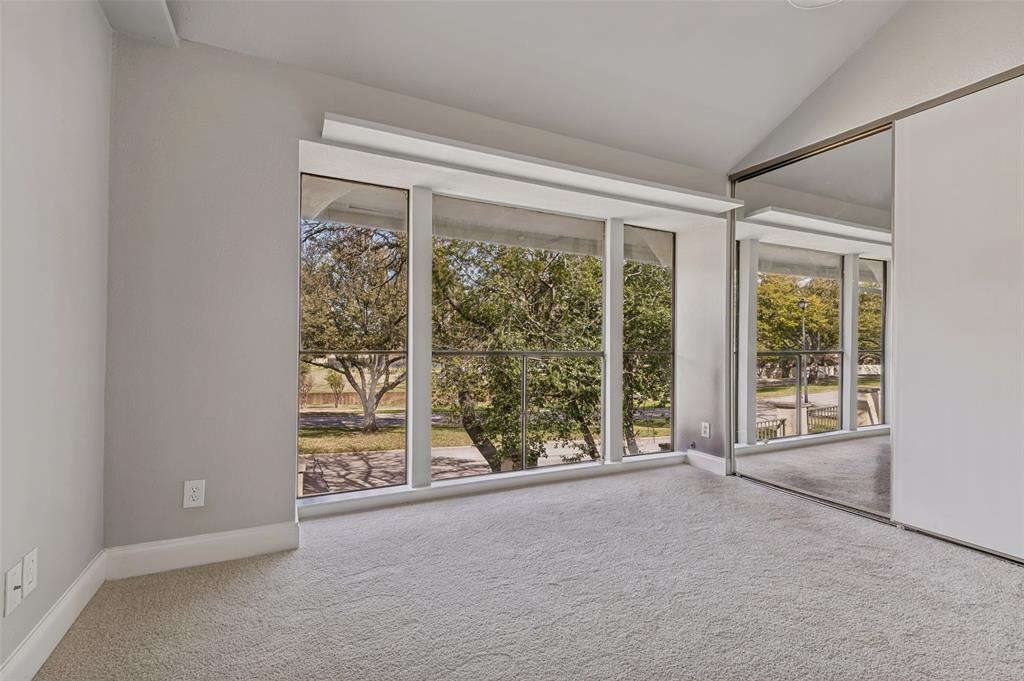 4505 North O'Connor Road, Unit 1121 Irving, TX 75062 - Photo 23 of 34 en empty room with windows