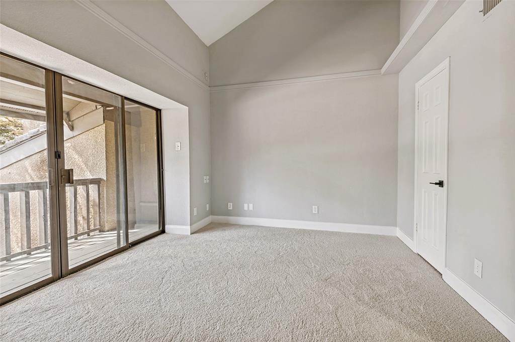 4505 North O'Connor Road, Unit 1121 Irving, TX 75062 - Photo 29 of 34 a view of an empty room with a window