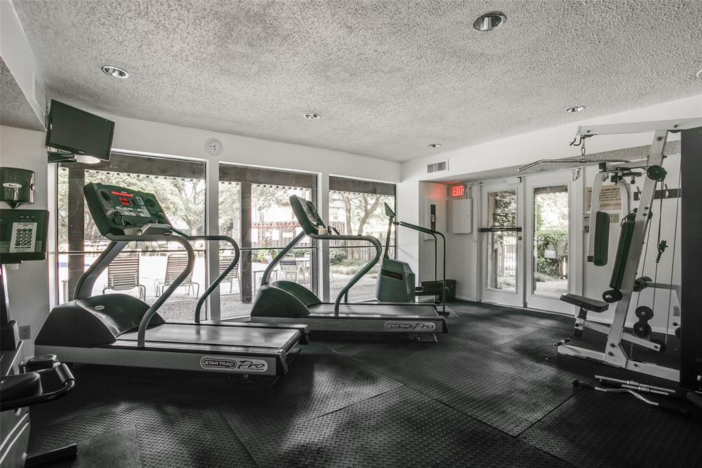4505 North O'Connor Road, Unit 1121 Irving, TX 75062 - Photo 30 of 34 a view of a room with gym equipment