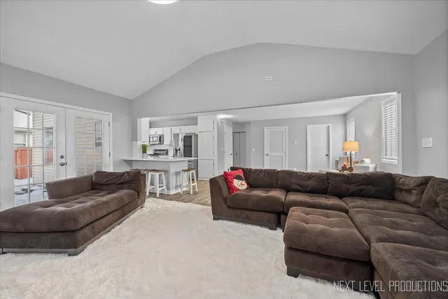 a living room with furniture and a couch