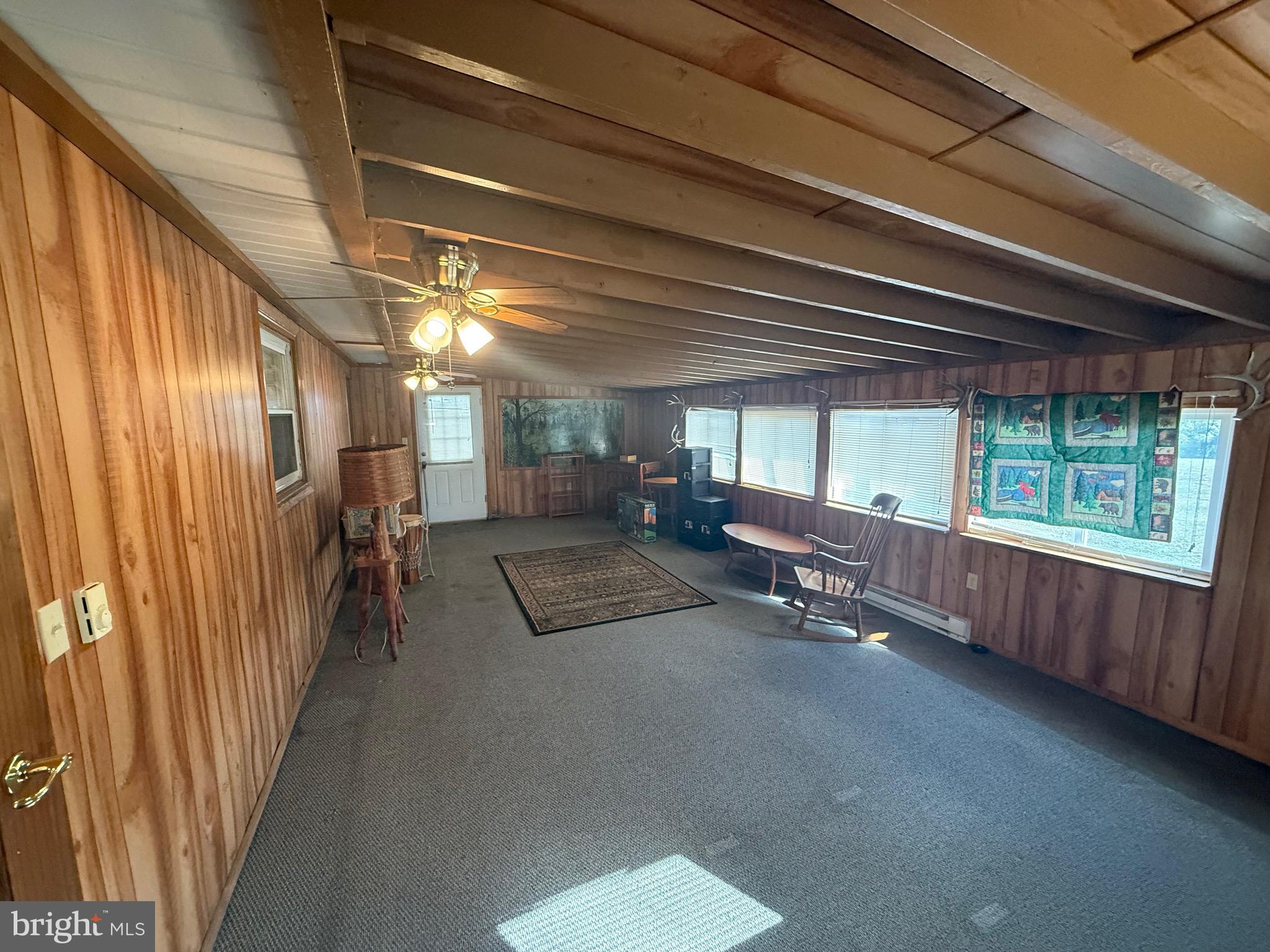 384 Fairview Drive Berkeley Springs, WV 25411 - Photo 17 of 24 a view of lobby with furniture and windows