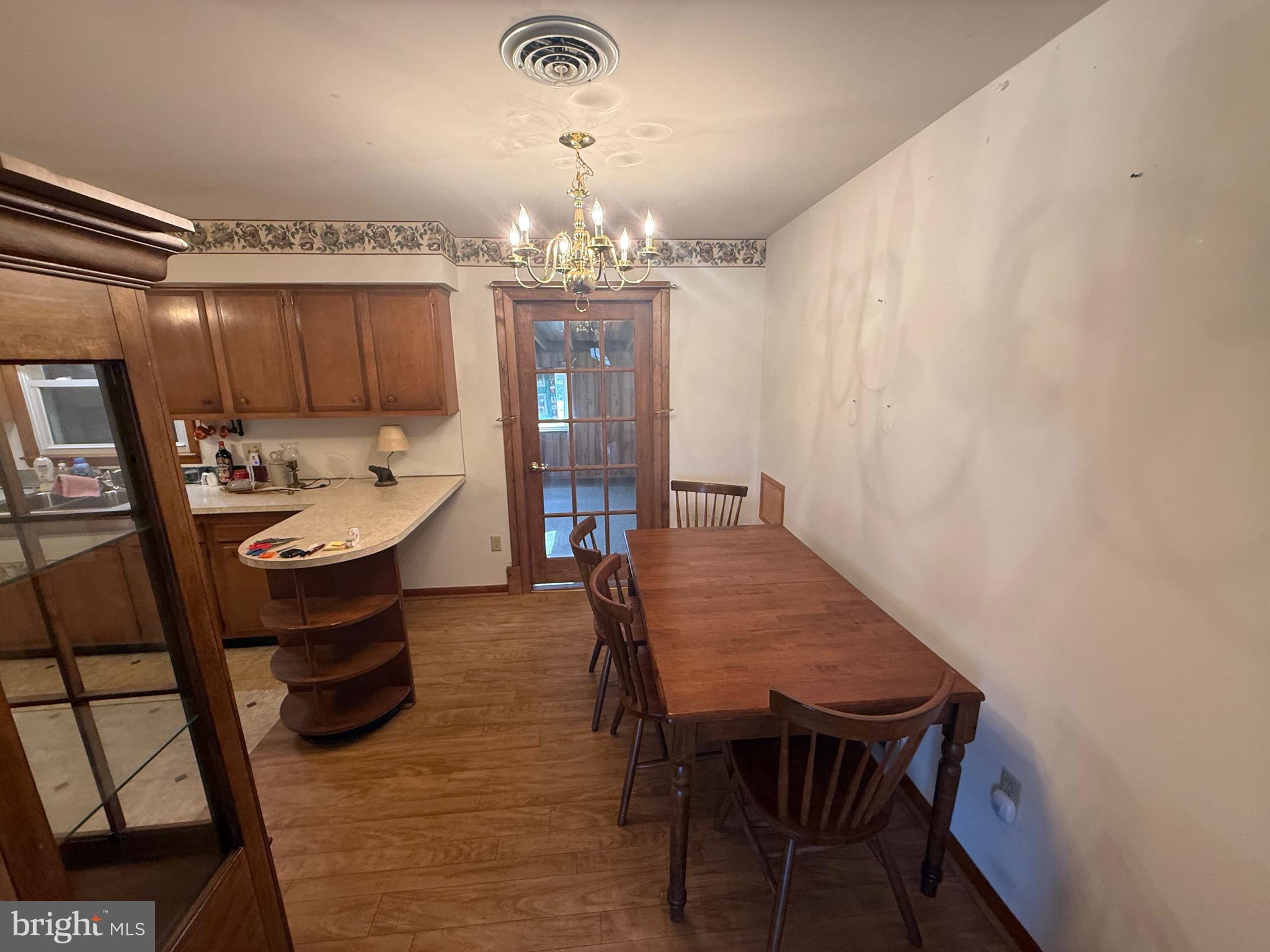 384 Fairview Drive Berkeley Springs, WV 25411 - Photo 18 of 24 a dining room with furniture and window
