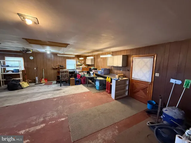 a room with furniture and a large window