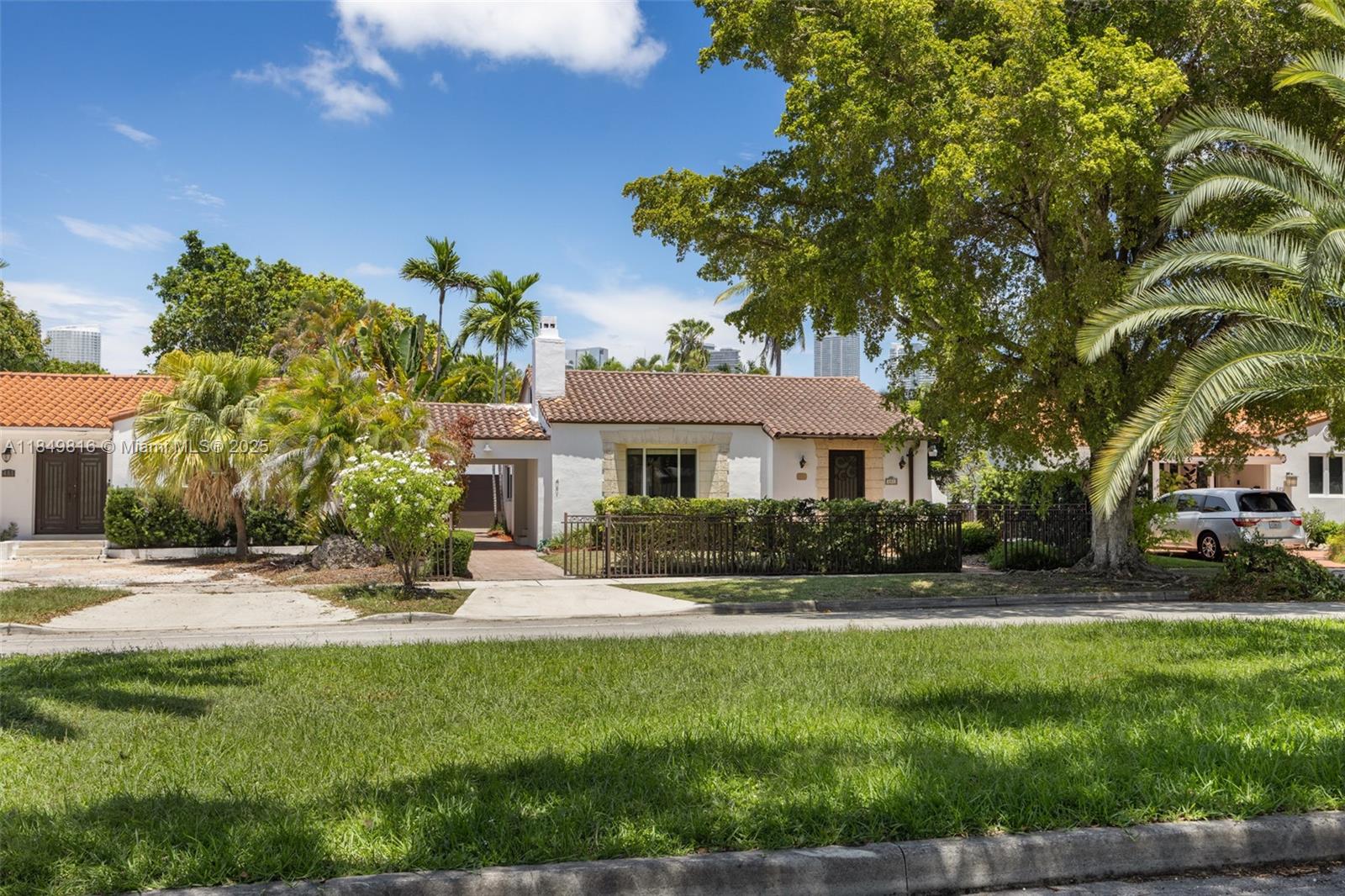 451 Southwest 25th Road Miami, FL 33129 - Photo 25 of 25 a front view of a house with a yard