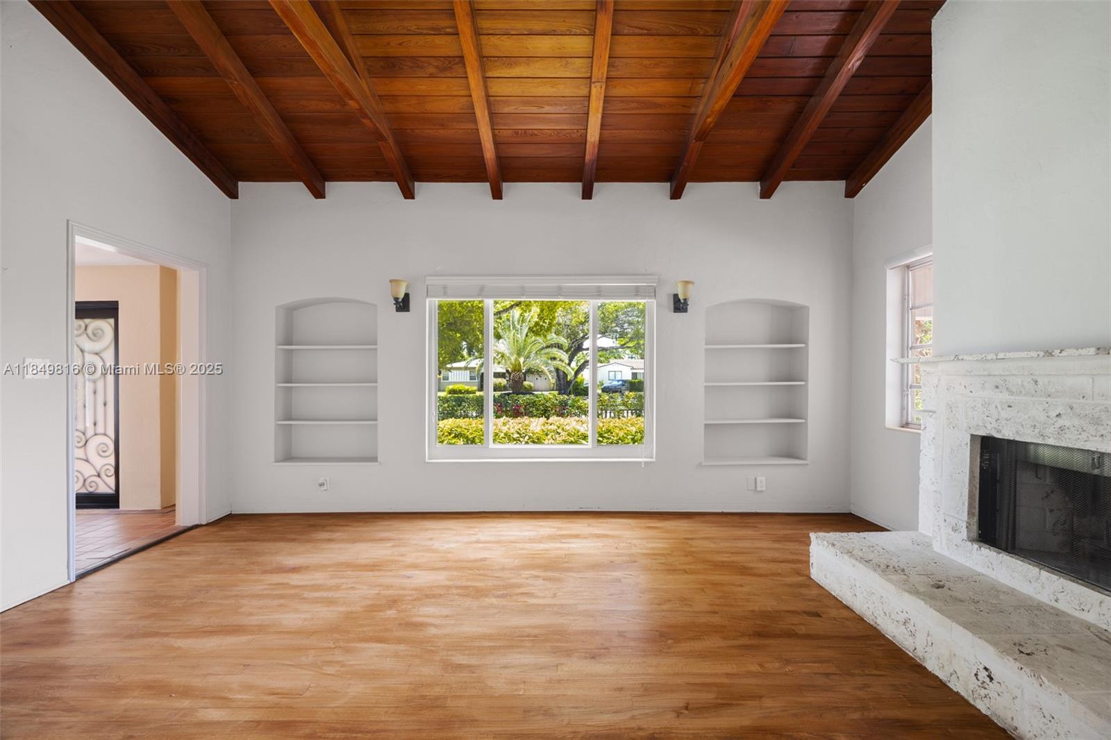 451 Southwest 25th Road Miami, FL 33129 - Photo 4 of 25 an empty room with windows