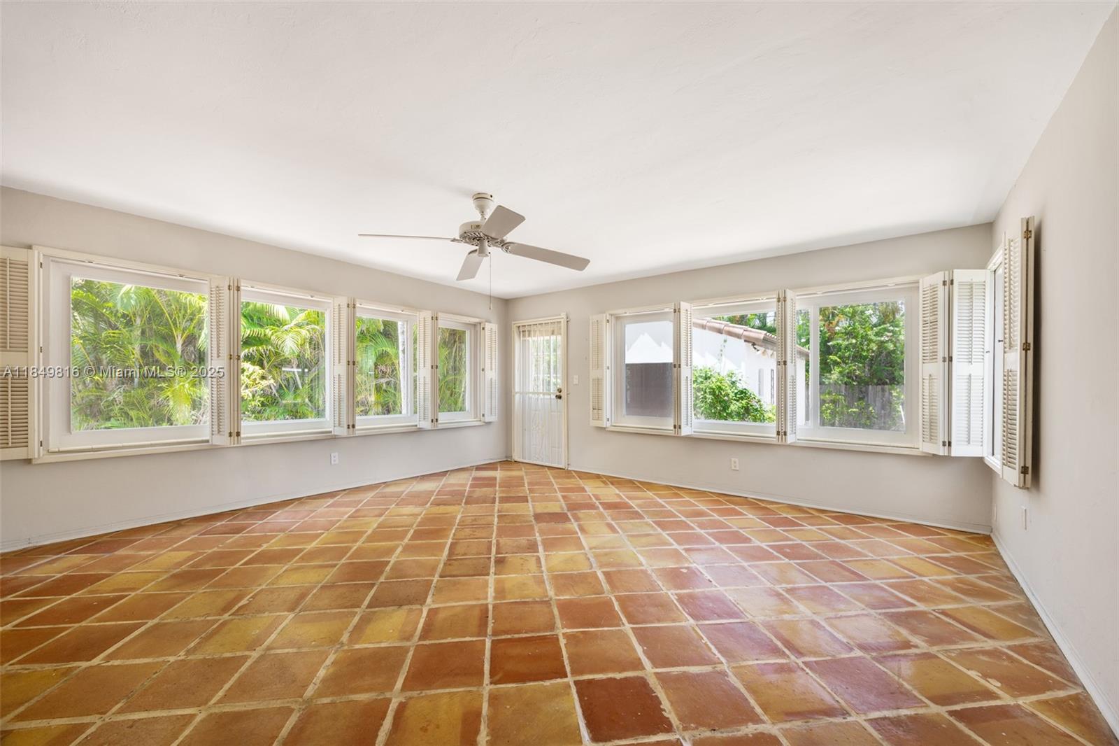 451 Southwest 25th Road Miami, FL 33129 - Photo 8 of 25 a view of an empty room with windows
