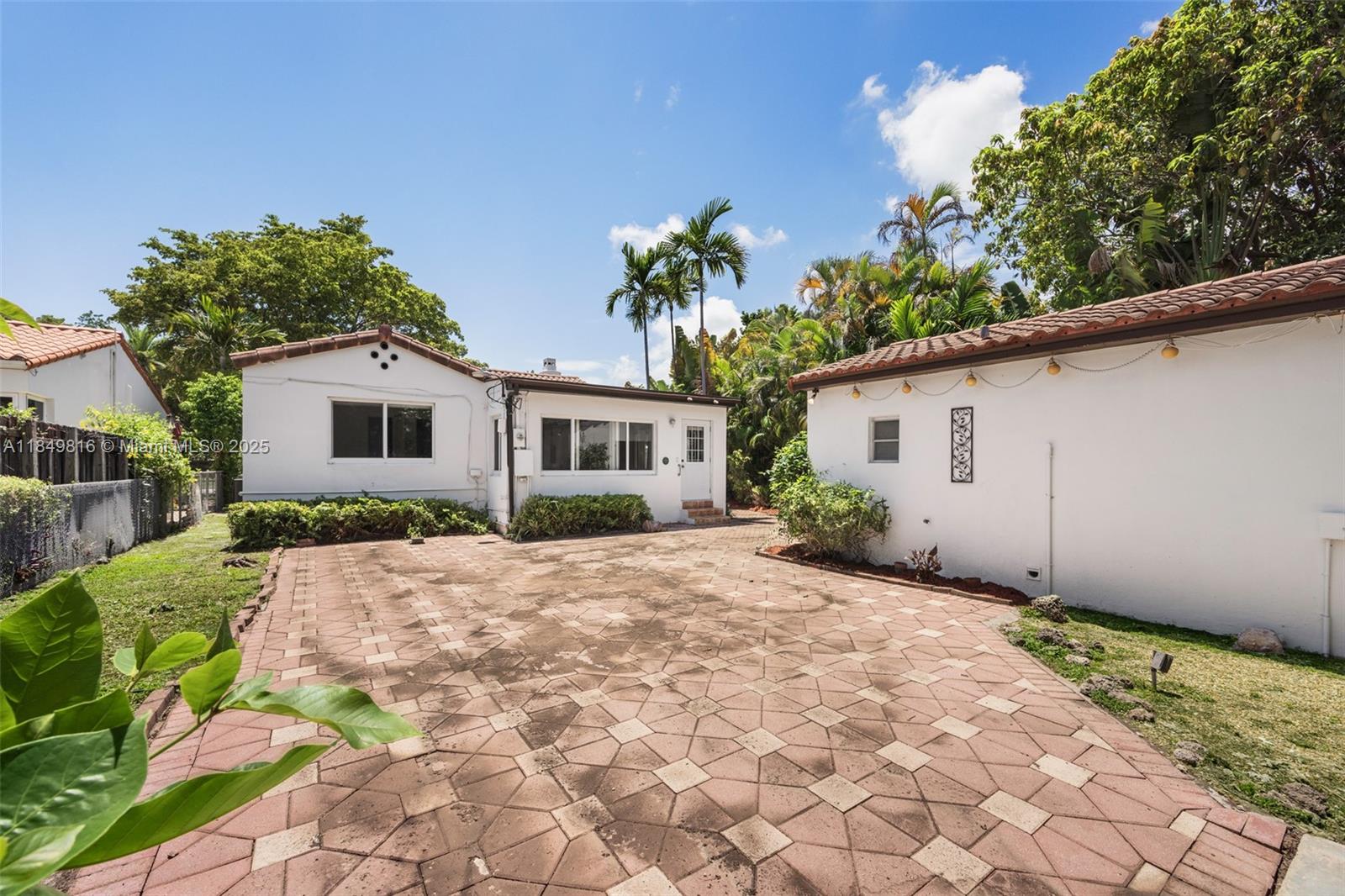 451 Southwest 25th Road Miami, FL 33129 - Photo 9 of 25 a view of a house with a yard