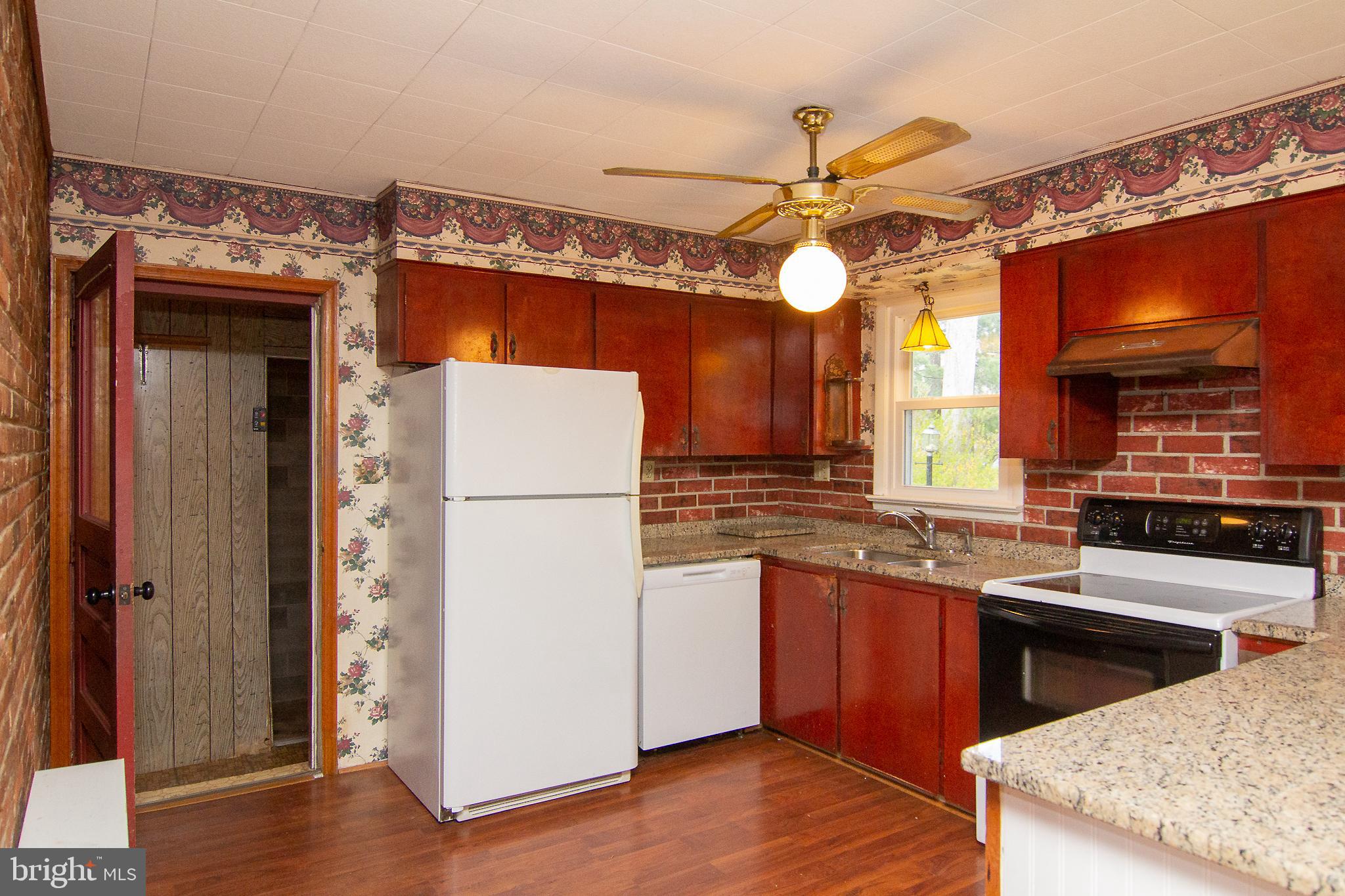 5125 Old Hanover Road Westminster, MD 21158 - Photo 14 of 35 Kitchen with door to garage and basement steps