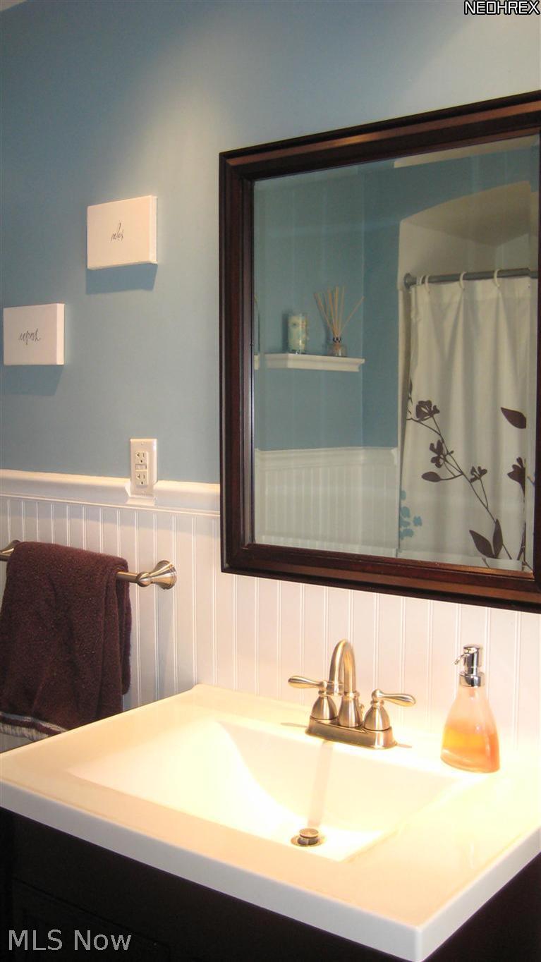 4154 Silsby Road University Heights, OH 44118 - Photo 15 of 18 Spacious spa-like bath with water/energy efficient shower, toilet and sink plus an additional half bath for your convenience.
