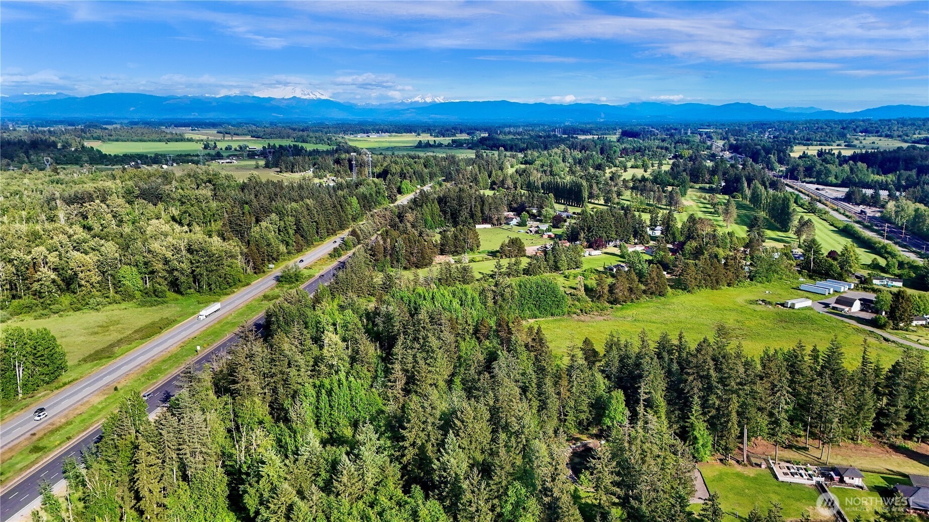 7928 Portal Way Custer, WA 98240 - Photo 37 of 39 a view of a city with lush green forest